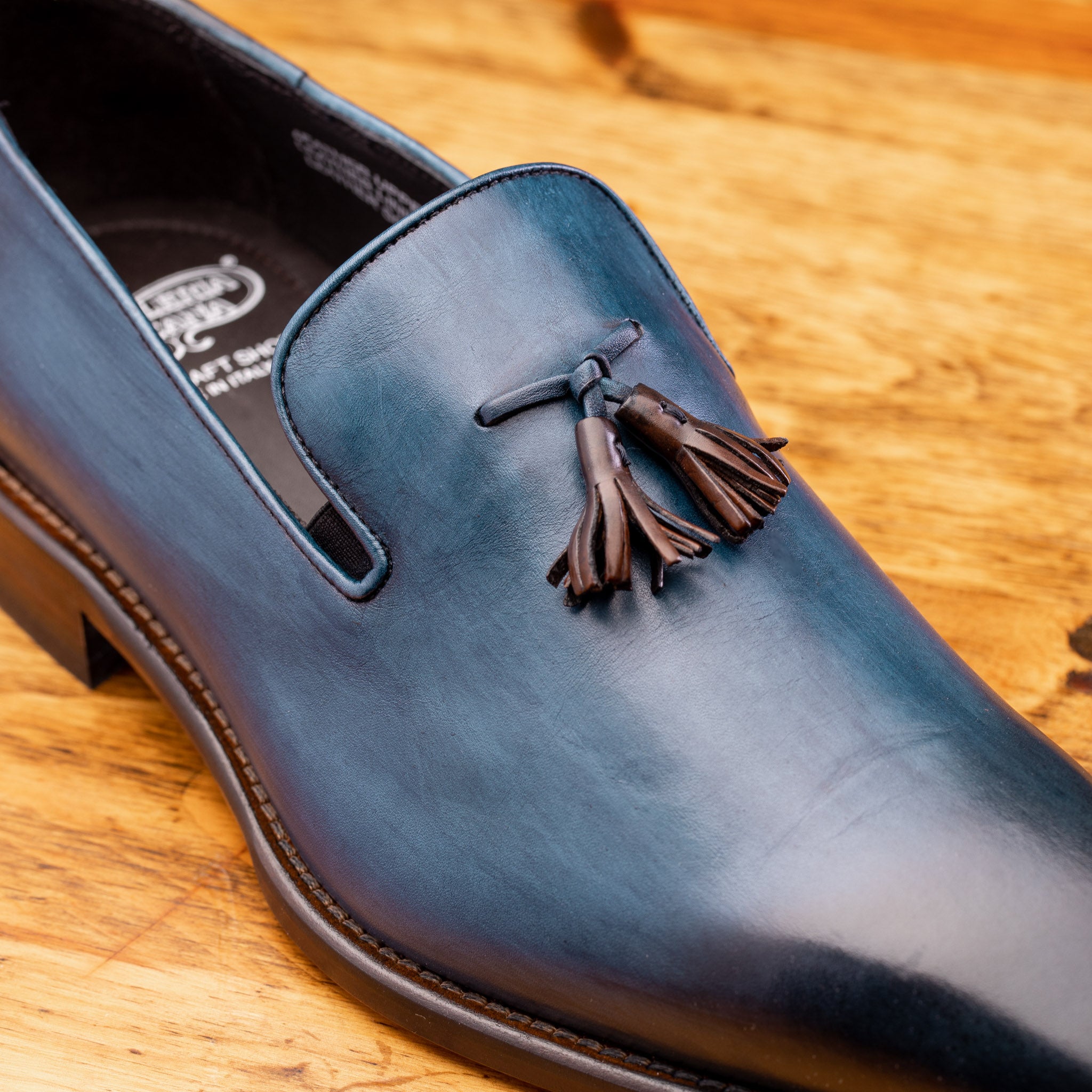Up close picture of the brown tassel on Z993 Calzoleria Toscana Ocean Blue David Tassel Slip-On